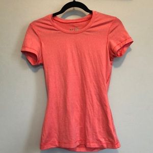Under Armour fitted pink heat gear top